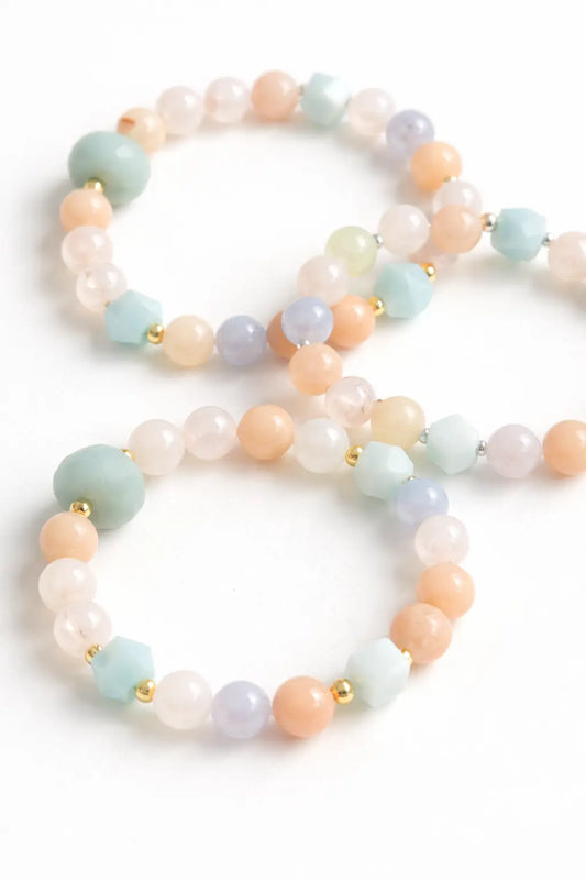 Pastel beaded necklace on a white background